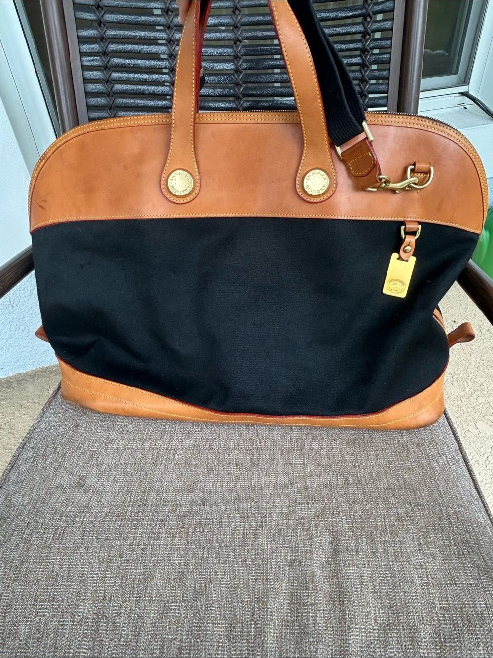 Dooney and Bourke Canvas and leather Weekender Bag - Black/Tan